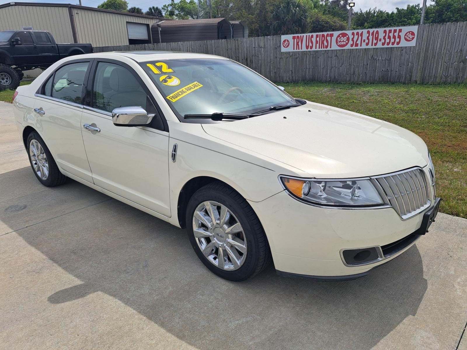2012 White Lincoln MKZ AWD (3LNHL2JC5CR) with an 3.5L V6 DOHC 24V engine, 6-Speed Automatic transmission, located at 1181 Aurora Rd, Melbourne, FL, 32935, (321) 241-1100, 28.132914, -80.639175 - Photo #1